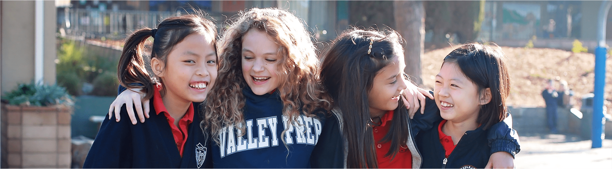 Female students laugh together